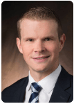 Headshot photo of Council Attorney Maxwell McCrite